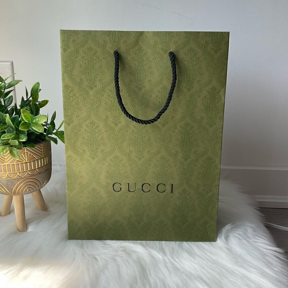 Authentic GUCCI embossed shopping bag plus tissue paper